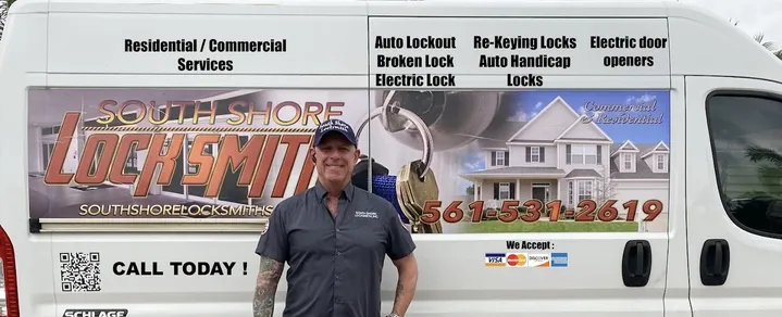 South Shore locksmith beside the company service van